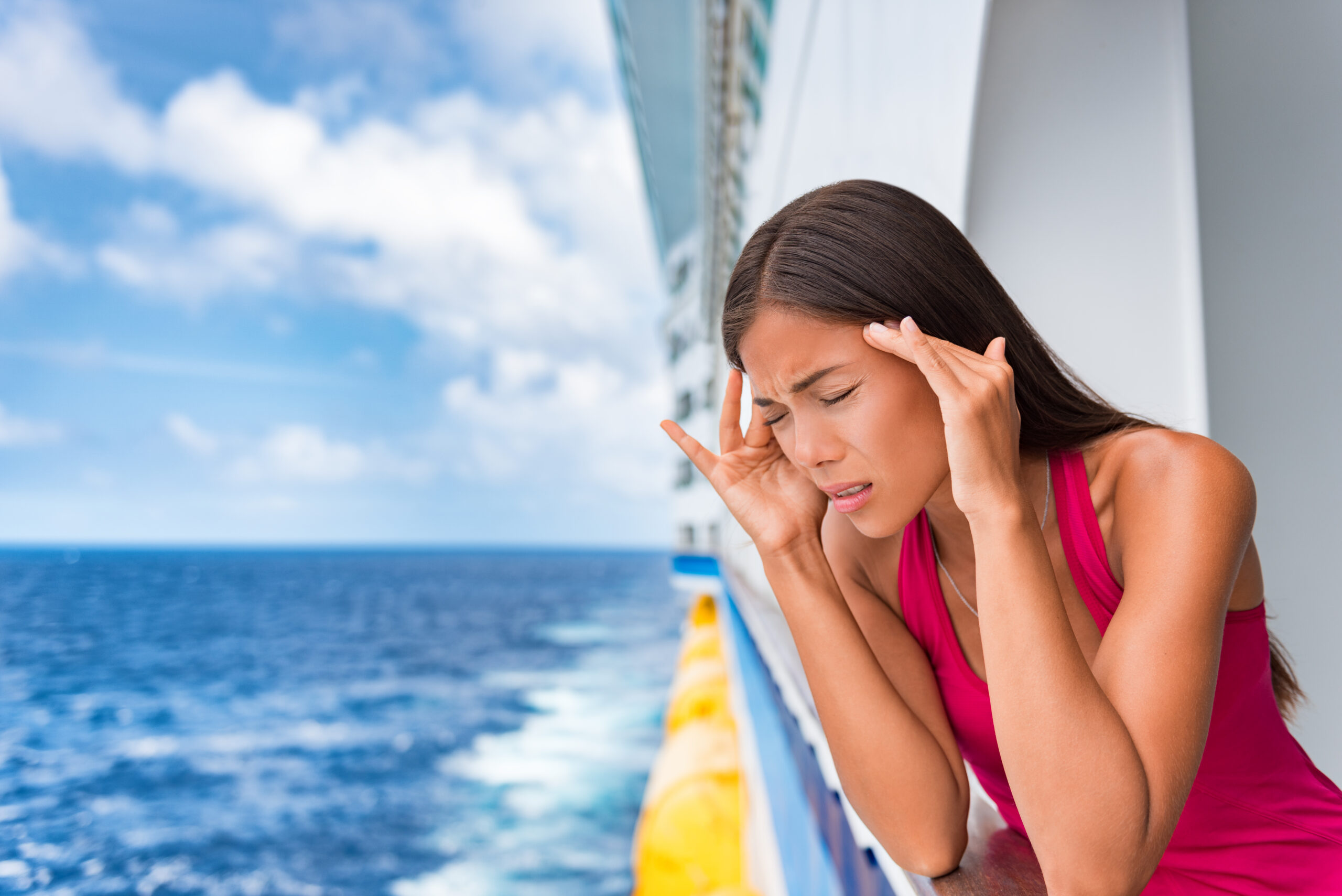 woman feeling seasick on cruise ship